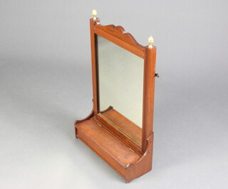 An Edwardian rectangular plate wall mirror contained in a walnut frame, the base incorporating a box with hinged lid 64cm h x 42cm w x 14cm d 