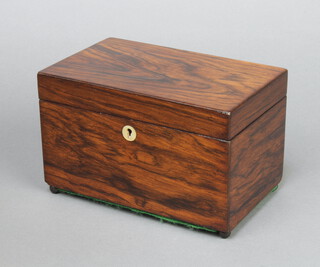 A rectangular Regency rosewood twin compartment tea caddy with hinged lid on bun feet 12cm x 19cm x 12cm 