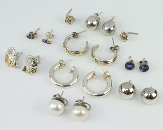 Nine pairs of silver earrings, gross 20 grams