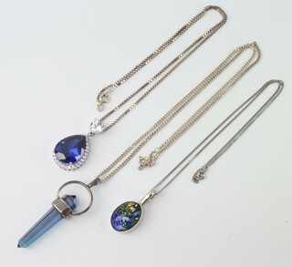 Three silver and hardstone pendants and chains, gross 37 grams