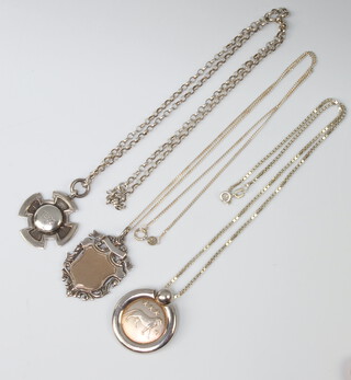 Three silver medallions and necklaces 35 grams 