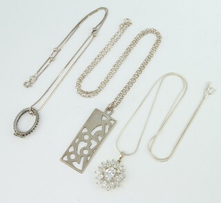 Three silver pendants and chains, gross weight 18 grams