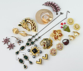 A Butler & Wilson enamelled giraffe brooch, a quantity of fashion jewellery 