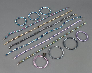 Six coloured cultured pearl necklaces together with 7 ditto bracelets 