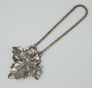 A Regency style silver plated pierced port label in the form of a leaf 