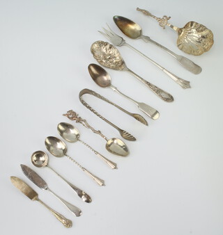 A Dutch silver sifter spoon and minor silver cutlery, 124 grams 