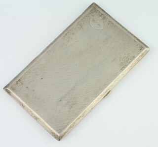 A silver engine turned cigarette case with presentation inscription Birmingham 1927, 14cm x 8cm, 192 grams 