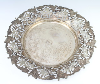 An Egyptian white metal dish with vinous rim 40cm, 1238 grams, engraved monogram 