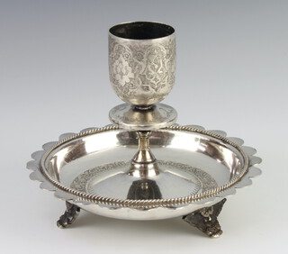 An Arabian white metal candlestick decorated with flowers 265 grams 14cm 