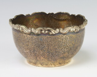 An Egyptian white metal bowl with scroll rim, 146 grams, 11cm 