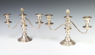 A pair of silver plated 3 light candelabra 23cm 