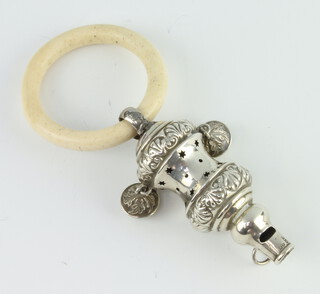 A silver repousse whistle, rattle teether, Birmingham 1920