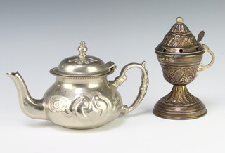 A white metal cup and cover with repousse decoration 14cm, 162 grams together with a teapot 