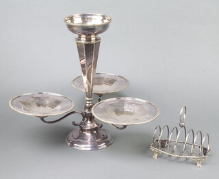 A silver plated octagonal tapered epergne with 4 dishes 40cm together with a 7 bar toast rack 