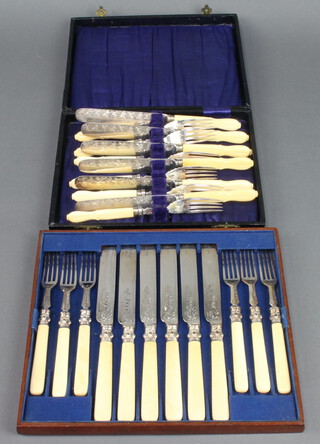Six pairs of silver plated dessert eaters with carved lily pattern handles, a set of 6 plated dessert eaters 