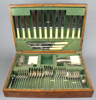 A canteen of Old English silver plated cutlery for 6 contained in an oak canteen, 63 pieces 