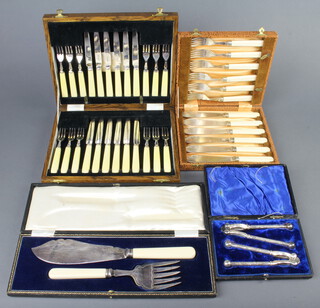 A set of 12 silver plated dessert eaters contained in an oak canteen, 3 cased plated sets 
