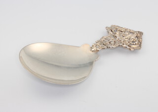 A Victorian silver caddy spoon with pierced handle London 1891, 31 grams 