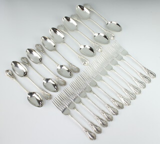 Twelve silver plated lily pattern dessert spoons and 12 dessert forks