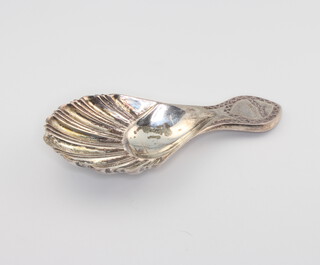 A Georgian design 925 standard caddy spoon with shell bowl 15 grams 