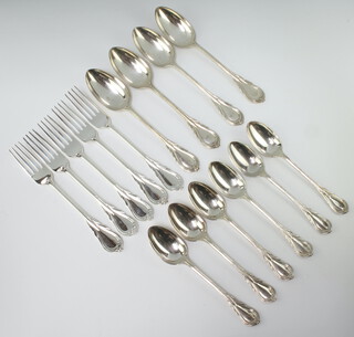 Four silver plated lily pattern tablespoons, five dinner forks and six dessert spoons 
