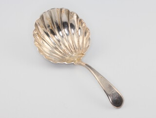 A Georgian silver caddy spoon with shell bowl 10 grams, rubbed marks 