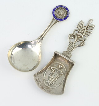 A silver caddy spoon Birmingham 1923, a Continental silver shovel 35 grams