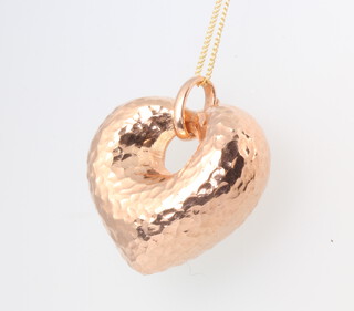 A 9ct yellow gold necklace 42cm together with a 9ct rose gold heart pendant 4.4 grams