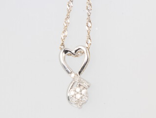 A 9ct white gold diamond set pendant gross weight 2.1 grams, on a 46cm chain 