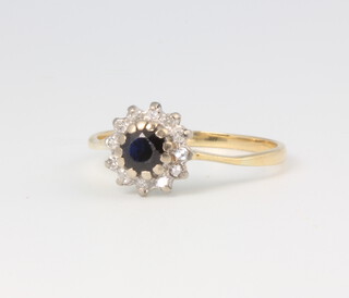 A yellow metal sapphire and diamond cluster ring, size J 1/2, 1.8 grams 