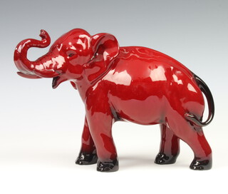 A Royal Doulton flambe figure of a standing bull elephant 17cm