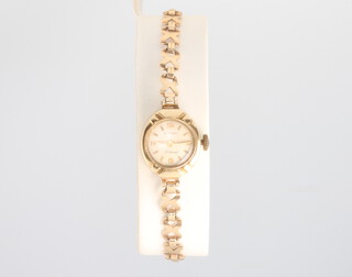 A lady's 9ct yellow gold Rotary wristwatch on a ditto bracelet 7.7 grams