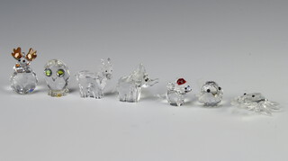 A Swarovski Crystal figure of a crab 4cm, baby elephant 3cm, mouse wearing a Christmas hat 3cm, chick 3cm, goat 4cm, owl 3cm (chipped beak) and a reindeer 4cm 