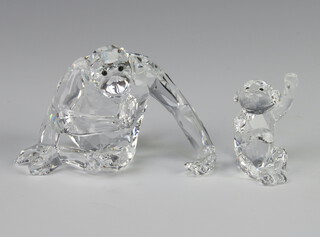 A Swarovski Crystal figure of a seated chimpanzee 6cm and a ditto baby 4cm 