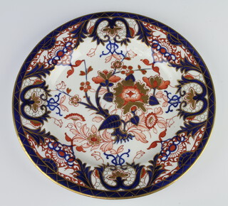 A 19th Century Royal Crown Derby plate decorated in the Imari pattern with flowers 25cm 