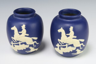 A pair of Weller Pottery 2 colour baluster vases decorated with an equestrian figure 14cm 