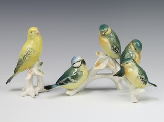 Karl Ens, a German figure group of 4 birds on a branch and ditto budgerigar on a stump 13cm 