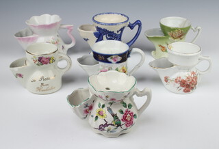 An Edwardian shaving mug decorated flowers and 6 others