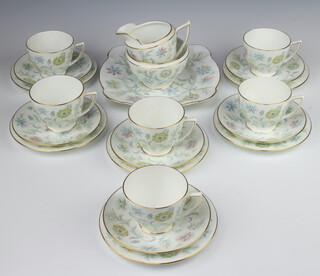 A Minton Vanessa pattern part tea set comprising 6 tea cups, sugar bowl, cream jug, 6 saucers, 6 small plates, sandwich plate