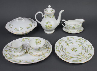 A Royal Grafton Evesham pattern dinner service comprising coffee pot, 6 coffee cups, 6 saucers, 6 two handled bowls, 6 saucers, milk jug, sugar bowl, sauce boat and stand, dish, 6 small plates, 6 side plates, 6 dinner plates, 2 tureens and covers and an oval meat dish 