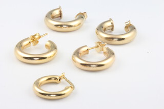 Two pairs of 9ct yellow gold earrings and 1 single earring 5.8 grams 