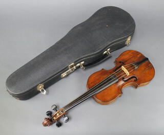 A child's violin, with 2 piece back 28.5cm, labelled Finally James Hay, prepared Guildford 1919, contained in a later fibre case  