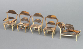 Four feather models of dining chairs 8cm h x 4cm w x 4cm d, ditto daybed (a/f) 5cm h x 6cm w x 5cm d (reputedly made by First World War German prisoners of war)  