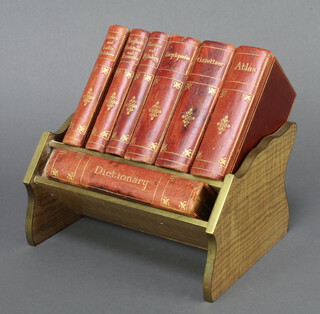Asprey's Reference Library, 7 leather bound volumes - "Atlas, English Quotations and Provenance, Classics and Mythology, French and English Quotations, Encyclopaedia, Gazetteer and Dictionary" contained in a mahogany and leather bound book trough 15cm h x 20cm w x 17cm d  