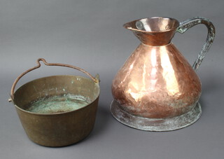A 19th Century 2 gallon copper harvest measure 31cm h x 32cm diam. together with a  19th Century brass preserving pan with iron handle 13cm x 26cm 