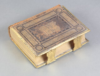 A Brown's Self Interpreting Family bible, brass and leather bound  