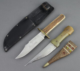 A G Wostenholm & Sons bowie knife the blade marked G Wostenholm & Sons Washington Works Sheffield IXL 13cm with horn grip together with an Eastern dagger with 12cm blade, horn grip and gilt metal scabbard 