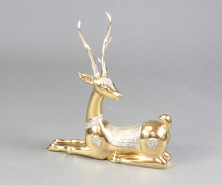 E Mendoza, a limited edition gilt bronze and silvered figure of a recumbent Chinese stag no.833/1000 43cm x 39cm x 11cm 