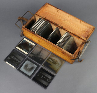 A collection of 45 19th Century black and white slides contained in a rectangular pine box 