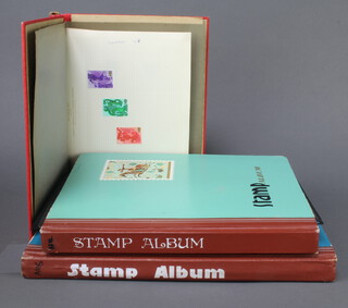 A red album of GB mint and used stamps George VI to Elizabeth II, stock book of New Zealand stamps George VI to Elizabeth II, ditto Australia 